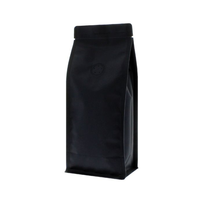 Matte black recyclable flat bottom coffee pouch with valve and tear notch.
